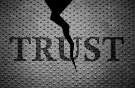 Cracked steel plate with the word Trust